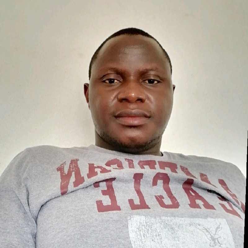 Dr smith nkhata wearing a gray shirt in a passport size photo